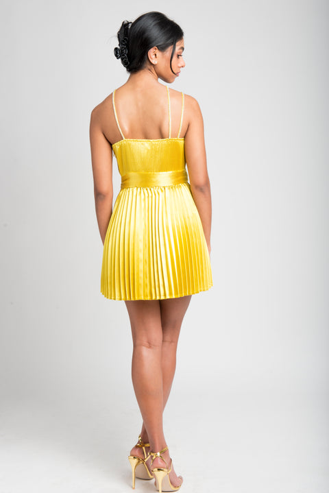 Golden Globe Dress in gold satin with pleated skirt, back view