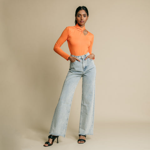 Orange, fitted, long sleeve bodysuit has cutaway detail on front. 