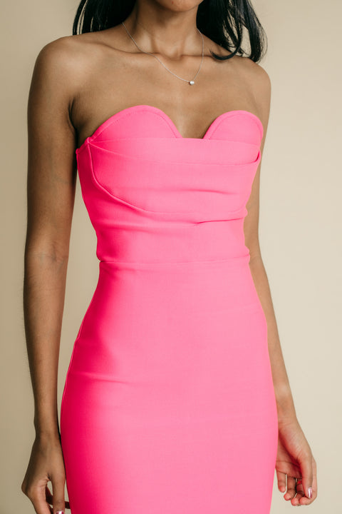 Strapless, knee-length, shaping, occasion dress.