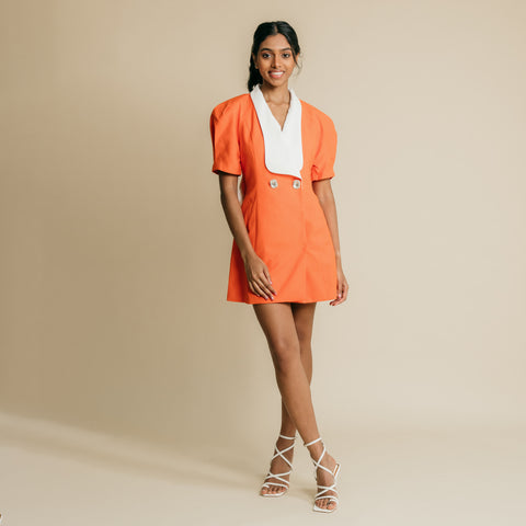 V-neck, button up jacket dress featuring cutaway back with white big ribbon.    