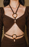 Neutral solid color top with vintage long, ruffle sleeve and halter straps.