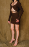 Neutral solid color top with vintage long, ruffle sleeve and halter straps.