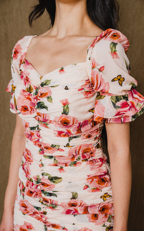 Mini, flower print, princess shoulder sleeve has front button up.