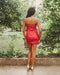 Red strapless, sparkly night dress with frill hem and mini length good for party, cocktail, wedding. 